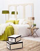 Comfortable green and white bedroom