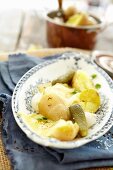Potato raclette with gherkins