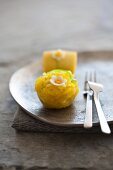 Marzipan confectionery decorated with marzipan narcissus flowers