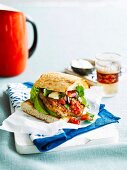 Cajun-spiced chicken burgers with salsa and avocado