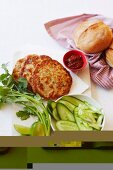 Thai fish burger with limes, cucumber and coriander