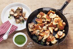 Chopped-up potato pancake with mushrooms