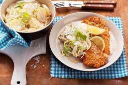 Schnitzel with an almond crumb coating and potato salad