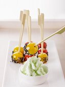 Cherry tomato skewers with sesame seeds and a wasabi dip