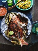 Barbecued snapper in a banana leaf with sambal belacan