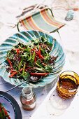 Herb salad with whole chillies for a tropical Christmas picnic