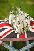 Bottles of lemonade in a wire basket for a picnic