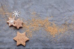 Star-shaped cinnamon biscuits with sugar icing