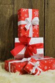 Stacked Christmas presents wrapped with ribbons