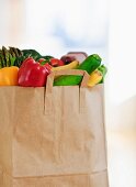 Paper bag filled with vegetables