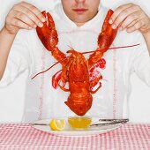 Man dining with an entire lobster