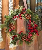 Couple holding christmas wreath