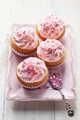 Pink cupcakes with sugar pearls