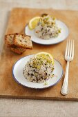 Cod tartar with black sesame and sprouts