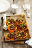 Yellow peppers stuffed with ground beef and kidney beans