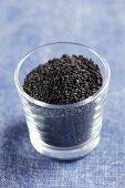 Black seed (Nigella sativa) in a glass