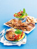 Barbecued chicken in curry marinade with mango salad