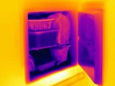 An infra-red image of an open refrigerator
