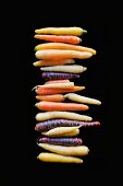 A stack of colourful root vegetables