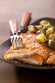 Scaloppine milanesi (breaded veal escalope with a side dish)