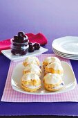 Profiteroles with ricotta and cherry filling