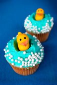 Cupcakes topped with decorative ducks