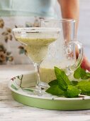 Kiwi and apricot smoothie with mint