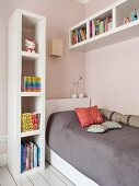 Teen bedroom, sleeping area with white book shelving