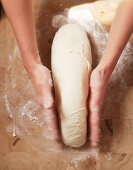 Kneading and Forming Bread Dough on a Floured Surface