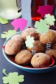 Mini doughnuts with paper New Year's decorations
