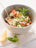 Couscous salad with tomatoes, cucumbers and mint