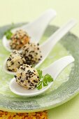 Quail's eggs with sesame seeds