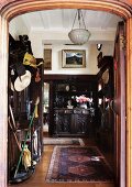 Eclectic lobby with antique furniture in a mix of styles