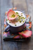 Rose custard with pistachios and rose petals