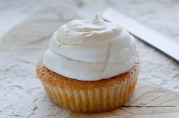 A muffin with a meringue top