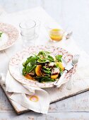 Spinach salad with pork and mandarins