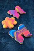 Colourful butterfly and flower biscuits