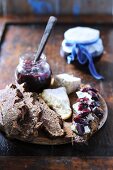 Spelt bread topped with cheese and grape jam