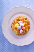 Yeast doughnut with marzipan eggs