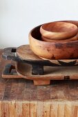 Set of wooden bowls on a surface made from sturdy wooden slats