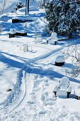 Snowy Backyard with Sledding Tracks