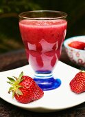 A pomegranate and strawberry smoothie