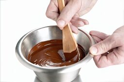 Melted chocolate being stirred