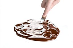 Melted cooking chocolate being spread
