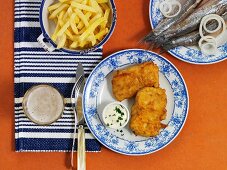 Lekkerbekje (fried fish, Holland) with skinny chips and beer