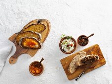Slices of sourdough bread with assorted spreads