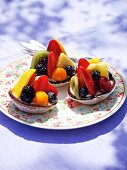 Three colourful fruit tartlets