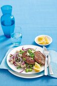 Steaks with bean salad