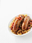 Bratwurst sausages with onions