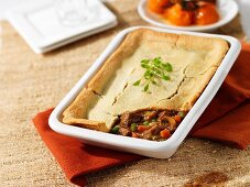 Beef ragout with a pastry lid